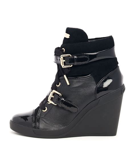 michael michael kors skid leather wedge bootie black|Michael Kors high heel booties.